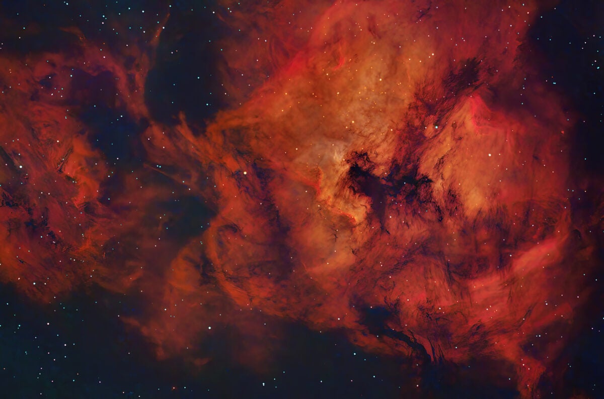 The fiery depths of the North America (NGC 7000) and Pelican (IC 5070) nebulae (located 1,600 and 4,000 light-years away, respectively) were imaged using one of the author’s favorite wide-field systems. This photograph consists of twenty-four 10-minute exposures in Hα and OIII.